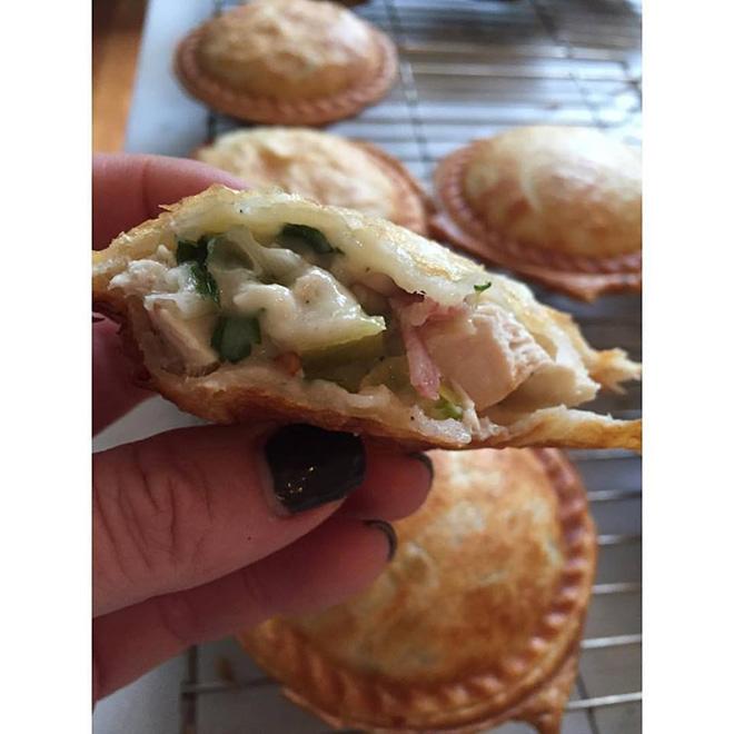 One of Nicky Tindill’s “lucky charm” meat pies undergoes the taste test in preparation for Wild Oats XI’s participation in the 71st Rolex Sydney Hobart race © Rob Mundle